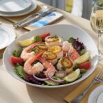 Colorful seafood salad recipe featuring fresh shrimp, scallops, crab meat, mixed greens, and lemon-Dijon dressing.